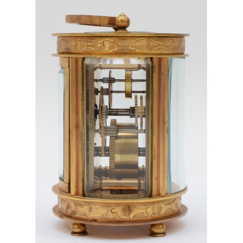 362 - An Elliott & Son eight day carriage clock, chased gilt case of oval form. 9cm tall.