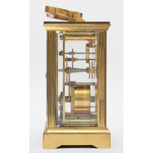 364 - A mid 20th century brass carriage clock, retailed by Mappin & Webb, having enamelled dial with Roman... 