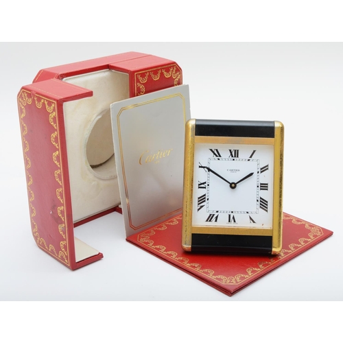 370 - Les Must de Cartier travel quartz alarm clock, reference no. 7505, serial no. 01716, rectangular whi... 