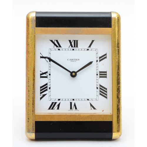 370 - Les Must de Cartier travel quartz alarm clock, reference no. 7505, serial no. 01716, rectangular whi... 