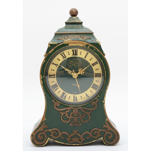 371 - A Jaeger Petite Neuchateloise musical alarm clock, the brass case with applied floral decoration on ... 