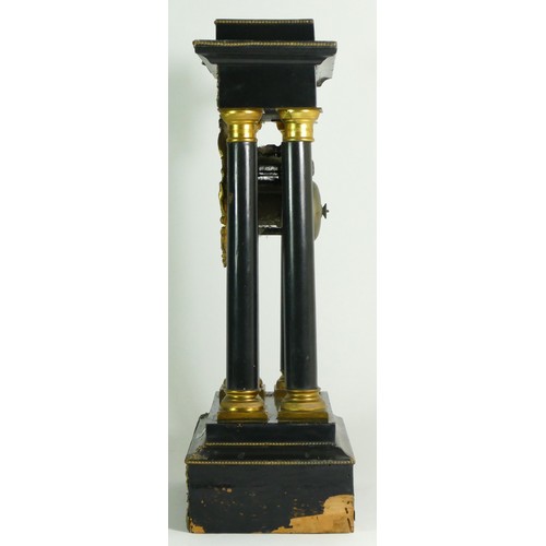 378 - A French Empire style ebony four pillar mantel clock, with eight day drum movement, striking on a si... 