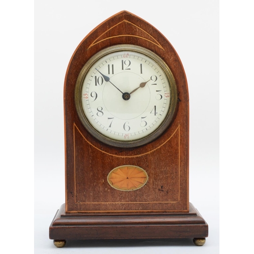 380 - An Edwardian inlaid mahogany mantel clock, having convexed enamel dial with arabic numerals with eig... 