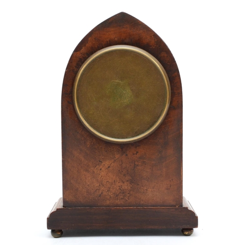 380 - An Edwardian inlaid mahogany mantel clock, having convexed enamel dial with arabic numerals with eig... 