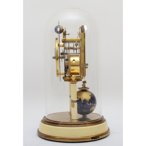 382 - A 1950s German Torsion 400-day anniversary clock, having moon phase and a painted globe of the world... 