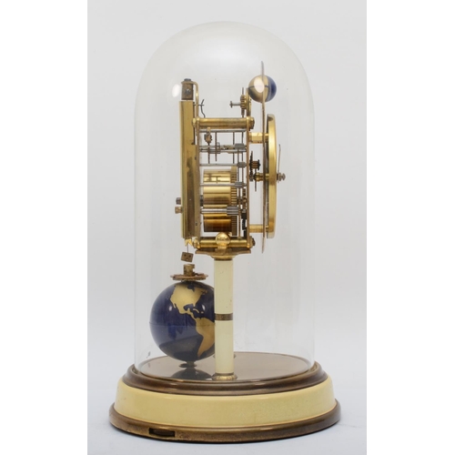 382 - A 1950s German Torsion 400-day anniversary clock, having moon phase and a painted globe of the world... 