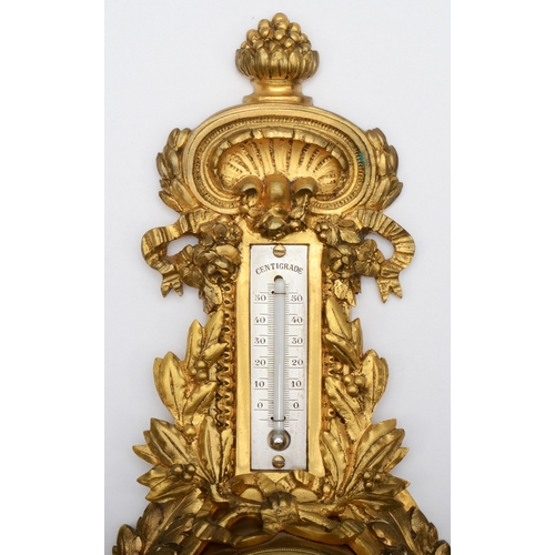 388 - A late 19th century French gilt bronze cartel clock with thermometer, the white enamel dial signed D... 