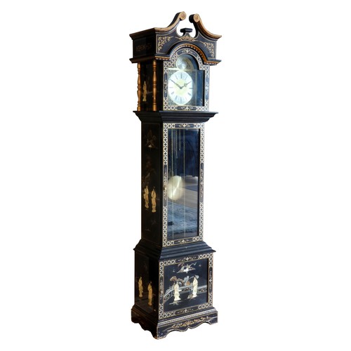 391 - A Chinoiserie lacquered longcase clock, the ebonised case with gilt border, painted Oriental landsca... 