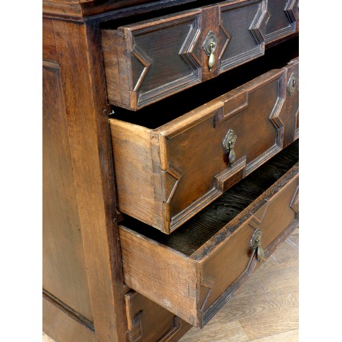 533 - A William III oak chest of drawers, having two short drawers over three graduated long drawers, moul... 