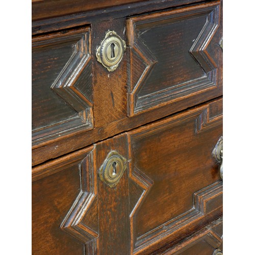 533 - A William III oak chest of drawers, having two short drawers over three graduated long drawers, moul... 