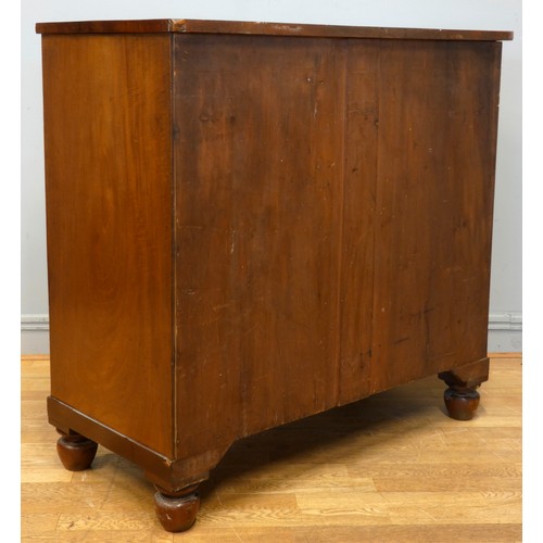 536 - An Edwardian mahogany chest of drawers, having two short over three long drawers, raised on bun feet... 