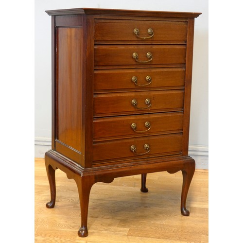 537 - An Edwardian mahogany six height music chest of drawers, having drop down drawer fronts with brass h... 