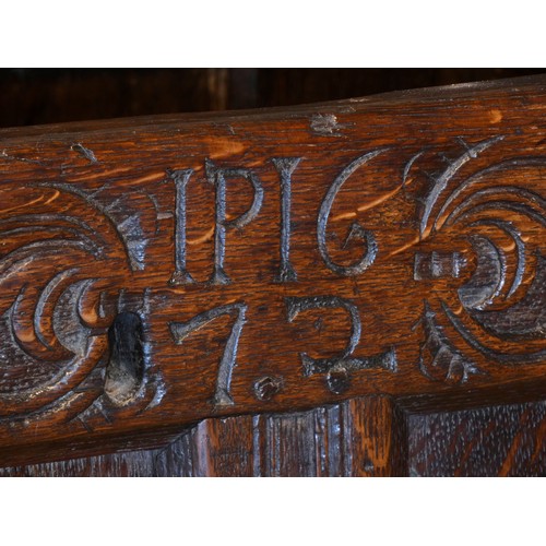 539 - A 17th century and later oak coffer, the rectangular panelled hinged lid with moulded edge, over fou... 