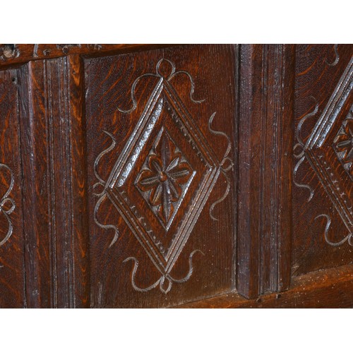 539 - A 17th century and later oak coffer, the rectangular panelled hinged lid with moulded edge, over fou... 