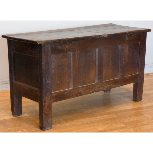 539 - A 17th century and later oak coffer, the rectangular panelled hinged lid with moulded edge, over fou... 