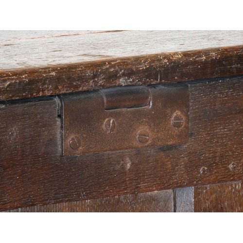 539 - A 17th century and later oak coffer, the rectangular panelled hinged lid with moulded edge, over fou... 