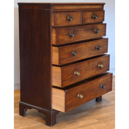 541 - A late 19th century mahogany chest of two short and four long graduated drawers, with cast brass kno... 