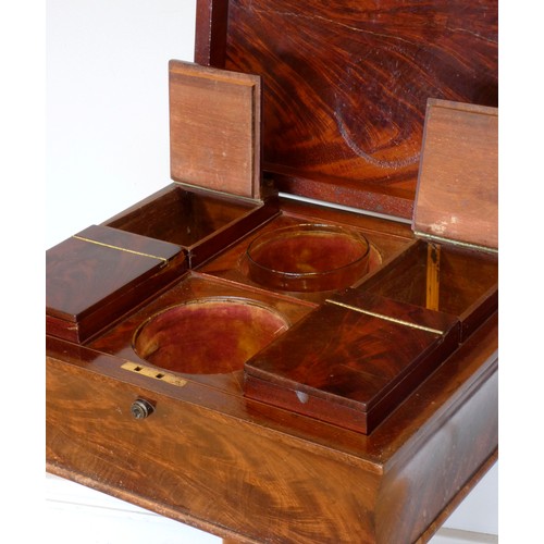 544 - A Regency rosewood teapoy, the rectangular sarcophagus-form case containing two pairs of removable l... 