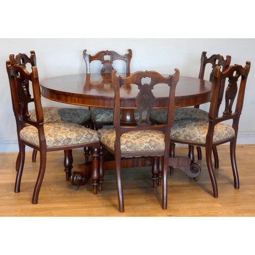 546 - A Victorian mahogany pedestal dining table with circular tilt top supported by a turned column on tr... 