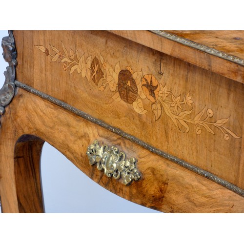 548 - A late 19th century French burr walnut and stained fruitwood writing table, with ormolu mounts, the ... 