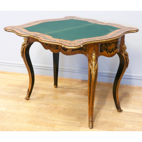 553 - A 19th century French serpentine kingwood and mahogany fold over card table, the ebony and stained f... 