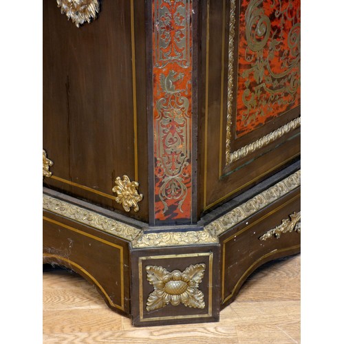 554 - A Napoleon III ebonised boulle pier cabinet, circa 1870/90, ormolu mounted detail, the brass and red... 