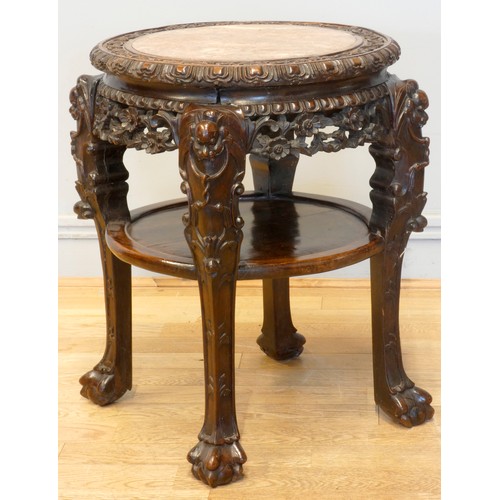 555 - A 19th century Chinese hardwood and marble circular occasional table, with pierced floral frieze, 46... 