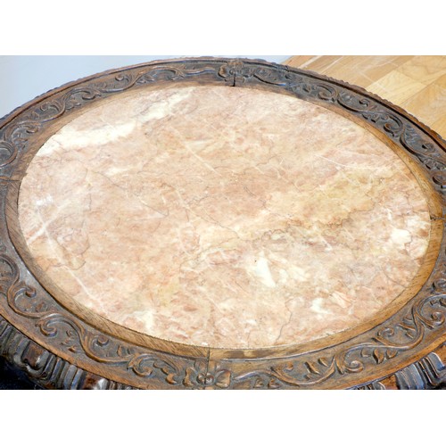 555 - A 19th century Chinese hardwood and marble circular occasional table, with pierced floral frieze, 46... 