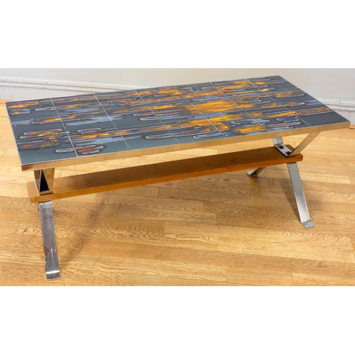 576 - A 1960s enamelled ceramic tiled coffee table, having three rows of ceramic tiles housed in a chromed... 