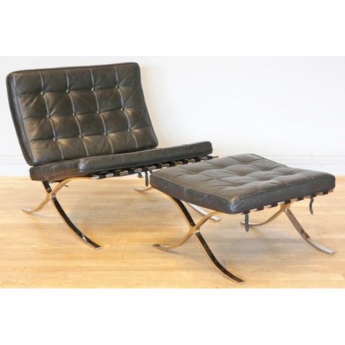 574 - A Robert Haussmann inspired Barcelona lounge chair and ottoman, upholstered black leather with butto... 