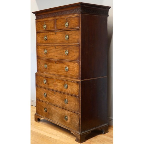 561 - A 19th century mahogany chest-on-chest, the base with three long graduated drawers below two short a... 