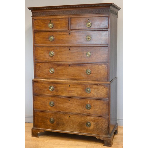 561 - A 19th century mahogany chest-on-chest, the base with three long graduated drawers below two short a... 