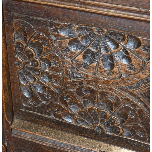 563 - Charles II and later oak press or court cupboard, dated 1688, the canopy top with inverted finials a... 