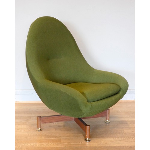 573 - A swivel egg chair by Greaves & Thomas, c.1960s, the moulded shell, upholstered in a sage green cott... 