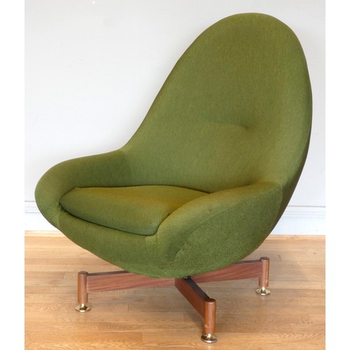 A swivel egg chair by Greaves Thomas c.1960s the moulded shell upholstered in a sage green cott