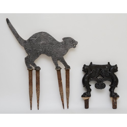 234 - A Victorian iron bird scarer in the form of a cat together with a Victorian cast iron boot scraper. ... 