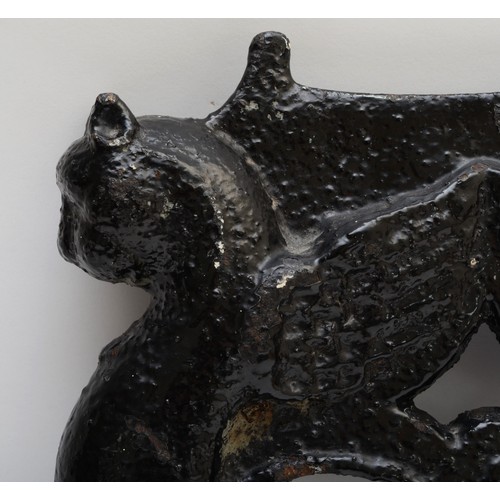 234 - A Victorian iron bird scarer in the form of a cat together with a Victorian cast iron boot scraper. ... 