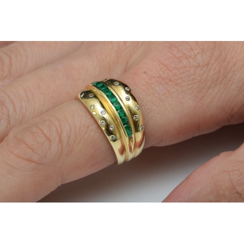 77 - A 14K gold emerald and diamond three row ring, gypsy set with brilliant cut stones, O, 5.7gm