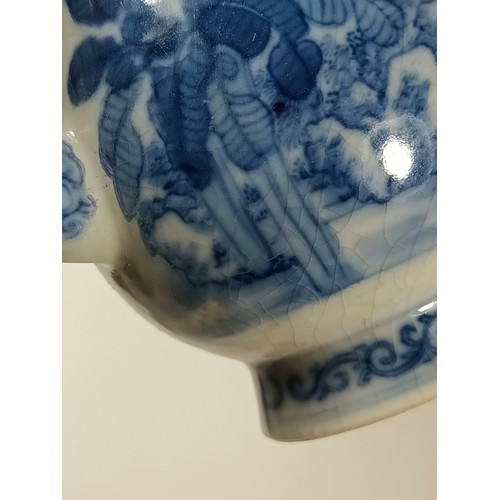 339 - A Chinese blue and white chocolate pot, with figural decoration, 18cm