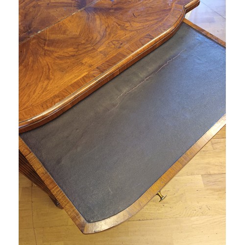 530 - A George II walnut kneehole desk, burrbanded quarter-veneered shaped top with moulded edge above bru... 