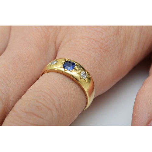 156 - A Victorian 18ct gold sapphire and diamond three stone ring, star gypsy set with old cut stones, N, ... 