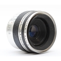 A Corfield Lumax 45mm f3.5 lens (serial number L1918122)