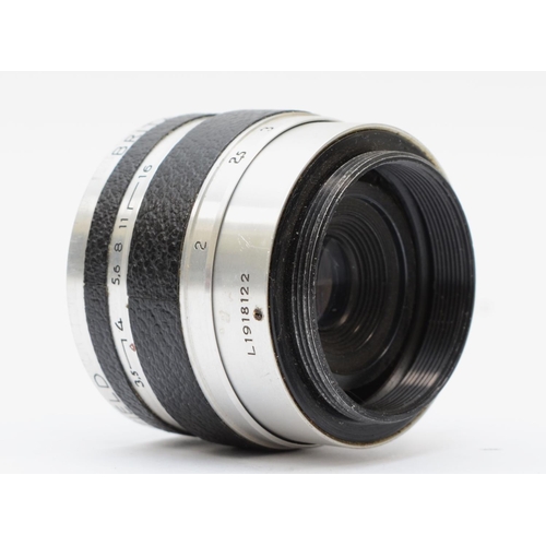 A Corfield Lumax 45mm f3.5 lens (serial number L1918122)