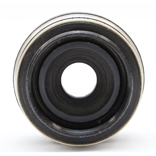 A Corfield Lumax 45mm f3.5 lens (serial number L1918122)