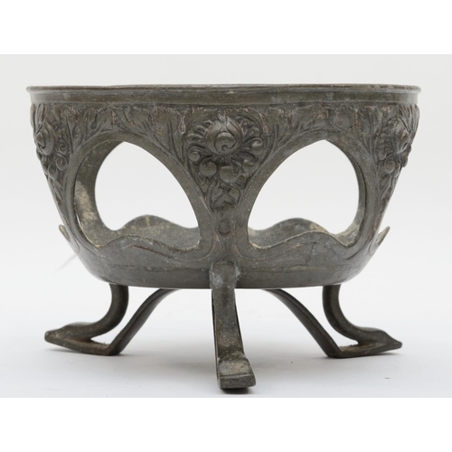 5 - Liberty & Co, and English pewter bowl, design 01147, with cast flotral motifs, raised on three legs,... 