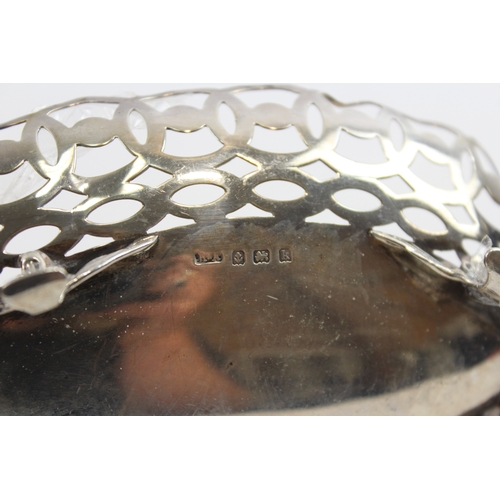 27 - An Edwardian silver oval pierced basket, Birmingham 1909, cast handles, 20cm, 106gm