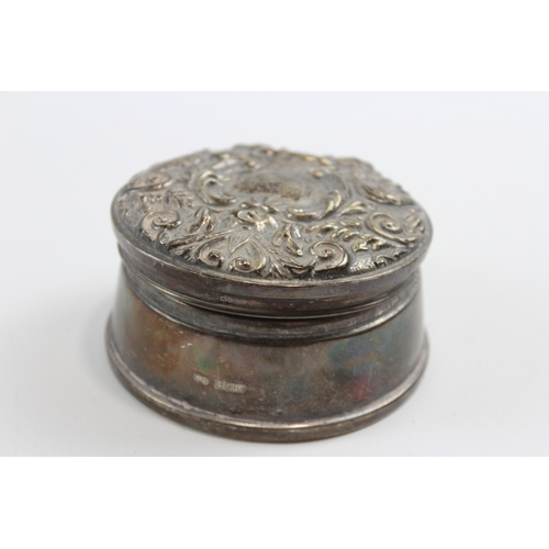 29 - A silver lidded trinket box, Birmingham 1991, with hinged and embossed cover, 8cm, loaded