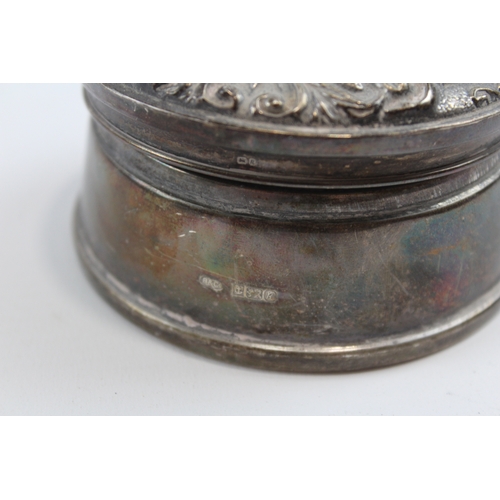 29 - A silver lidded trinket box, Birmingham 1991, with hinged and embossed cover, 8cm, loaded