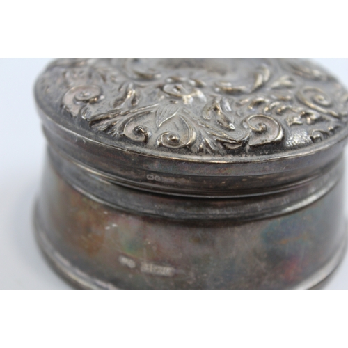 29 - A silver lidded trinket box, Birmingham 1991, with hinged and embossed cover, 8cm, loaded