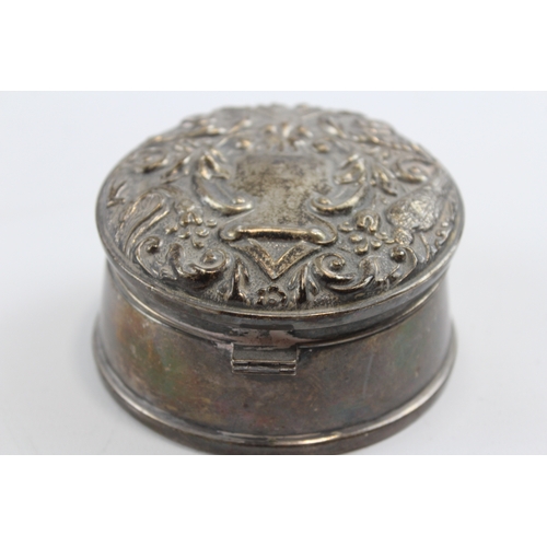 29 - A silver lidded trinket box, Birmingham 1991, with hinged and embossed cover, 8cm, loaded